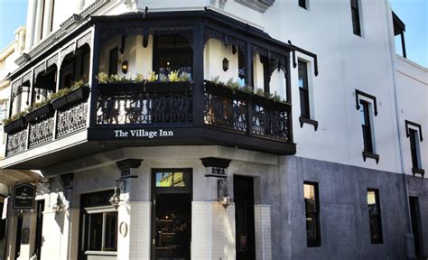 THE VILLAGE INN .
